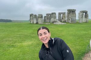 Kelly's daughter standing in front of Stonehedge